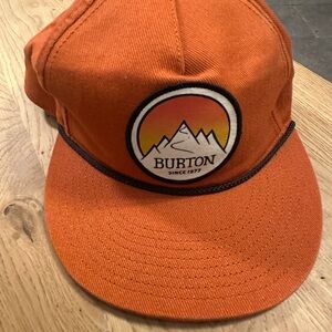 Burton burnt orange hat with mountain patch OS like‎ new without tags